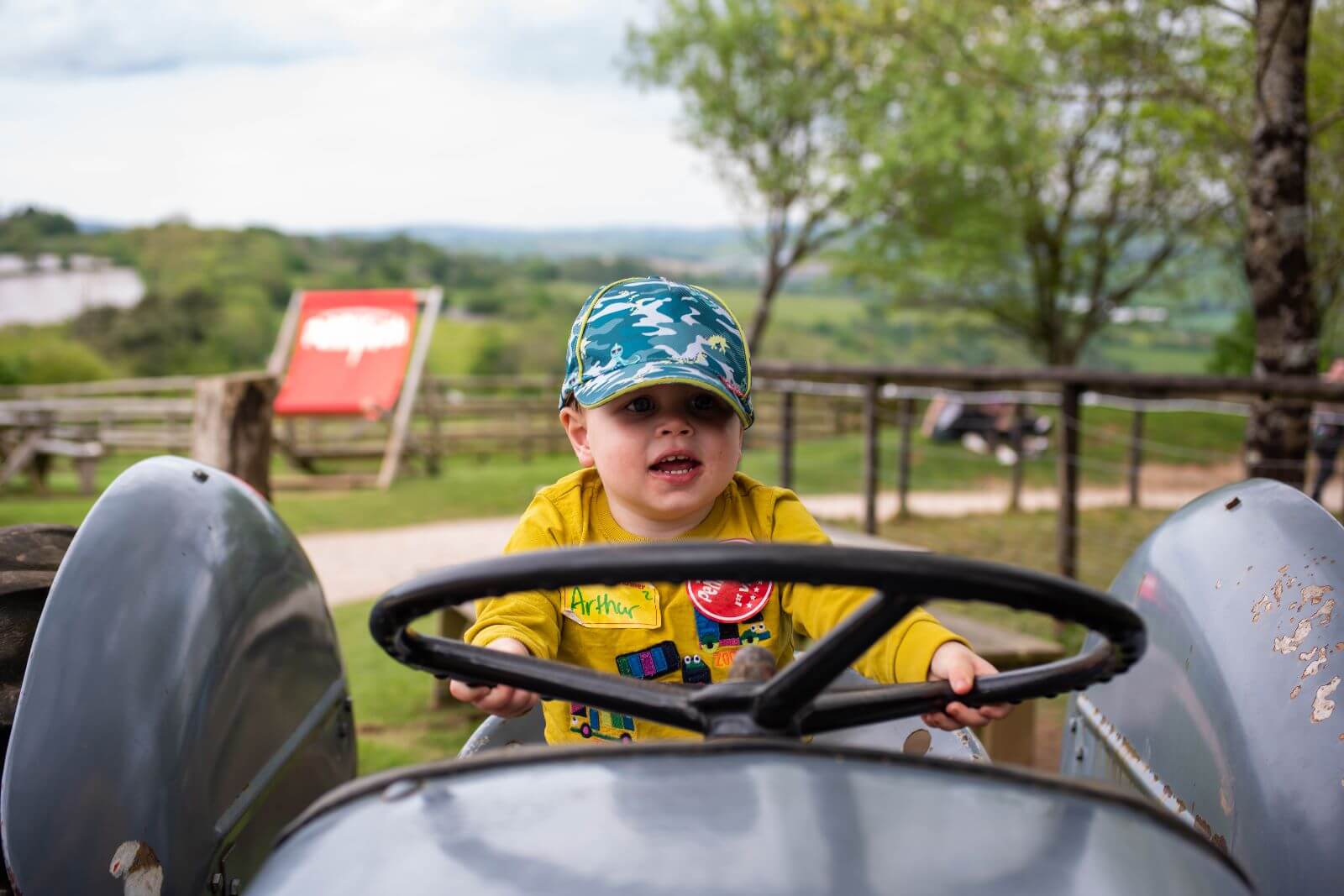 Child on tractor Pennywell Farm