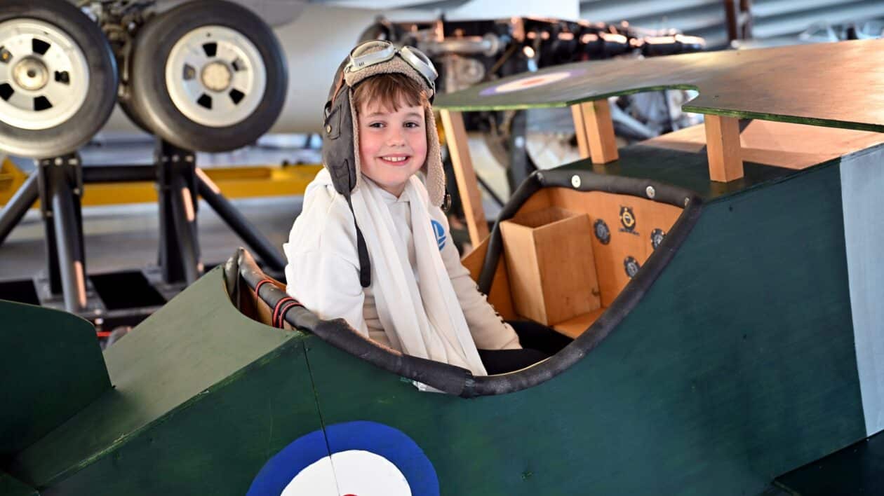 boy in toy plane