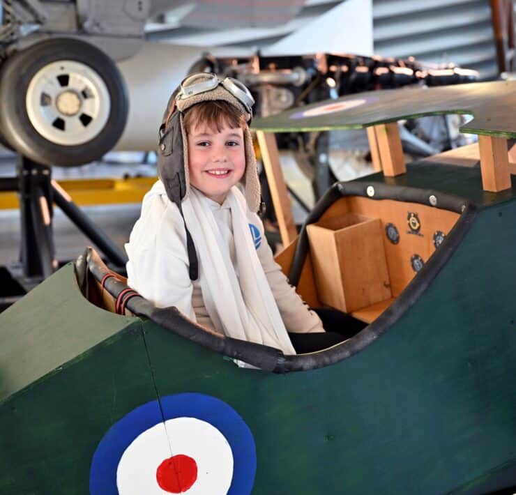 boy in toy plane
