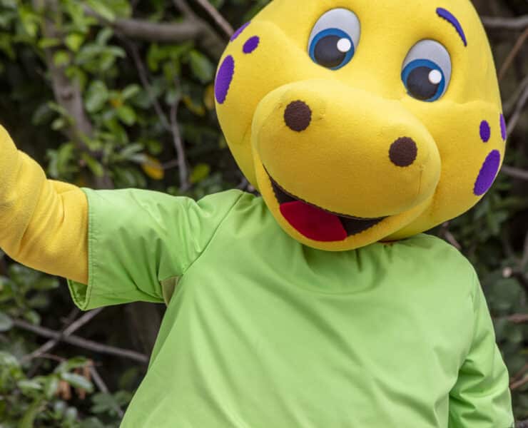 Dinosaur character waving