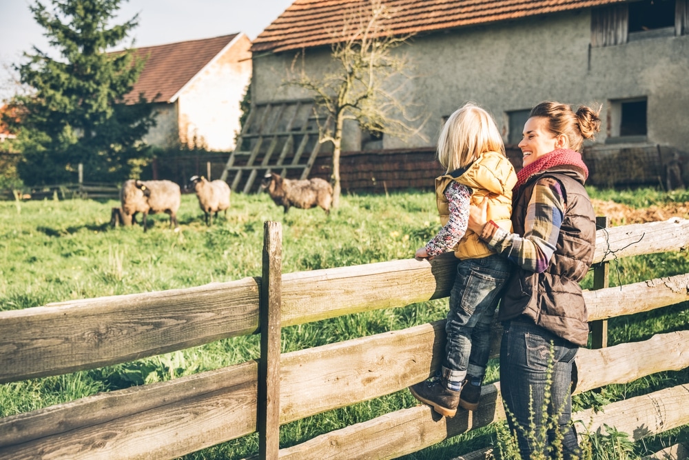 Mother and daughter on a farm