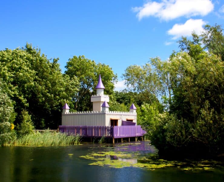 Princess palace on water at gullivers theme park