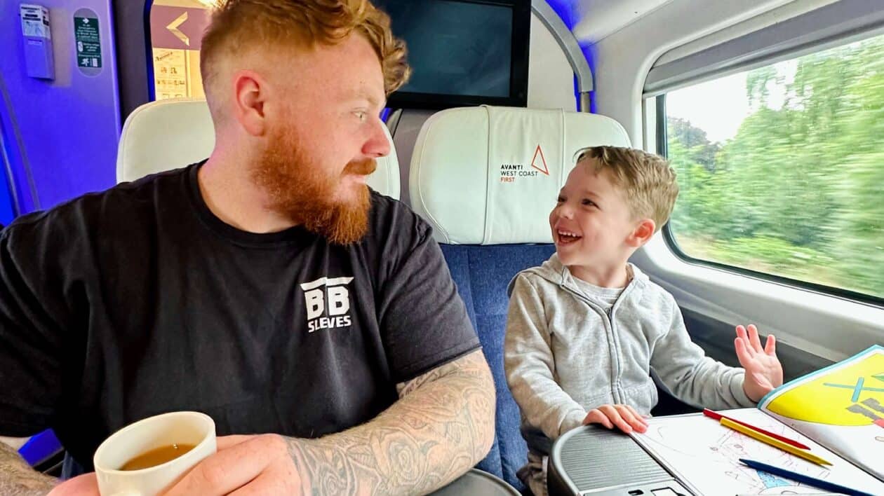 Father and son on board Avanti train