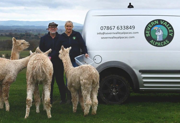 lorraine and andrew next to the severn valley alpacas and van