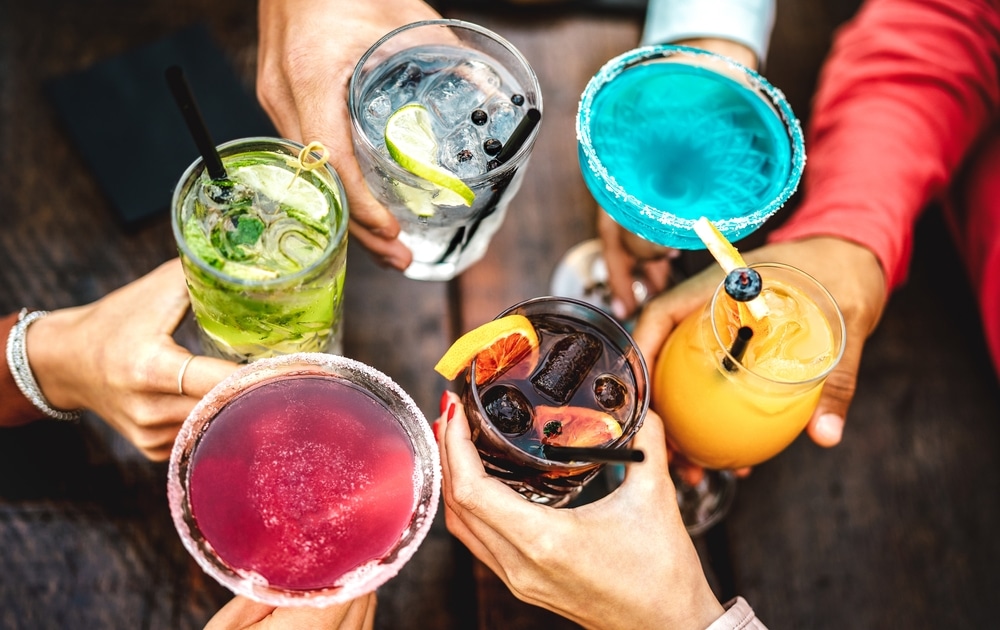friends cheers with cocktails