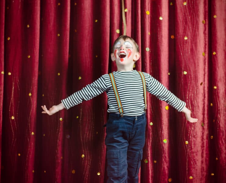 child clown performing