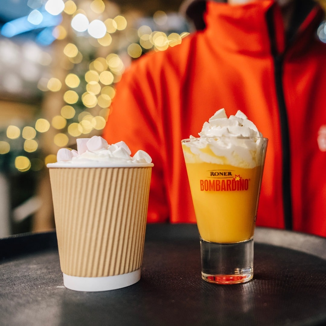 hot chocolate and festive shot with whipped cream