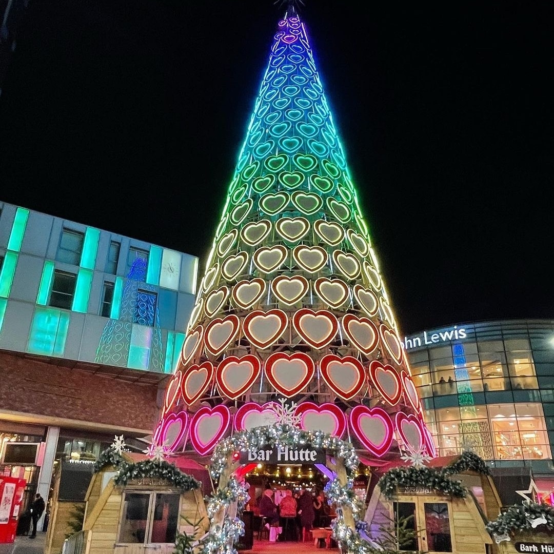 bar huttes under multi-coloured light installation next to liverpool one shopping centre