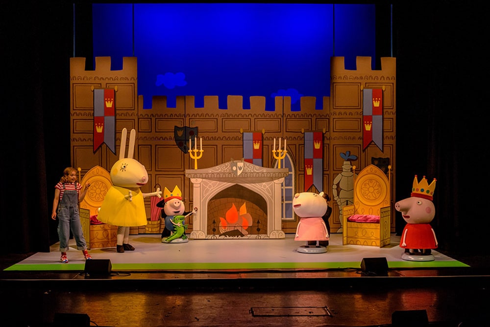 peppa pig and family in a castle