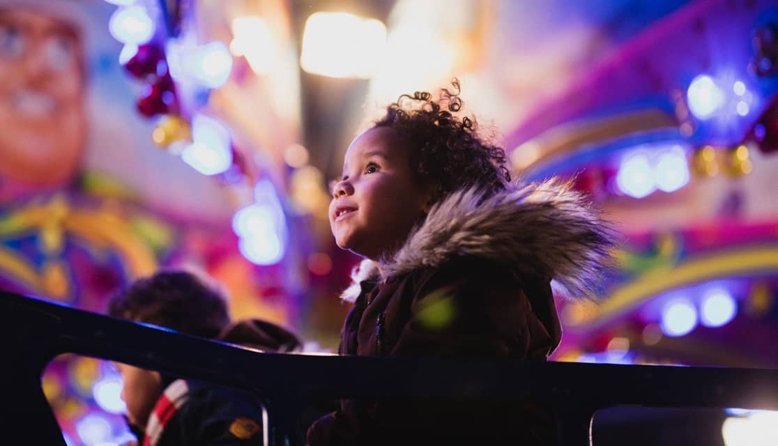 little girl looking up at the sky