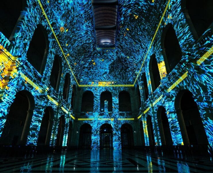 night skies projected onto church walls in genesis light show