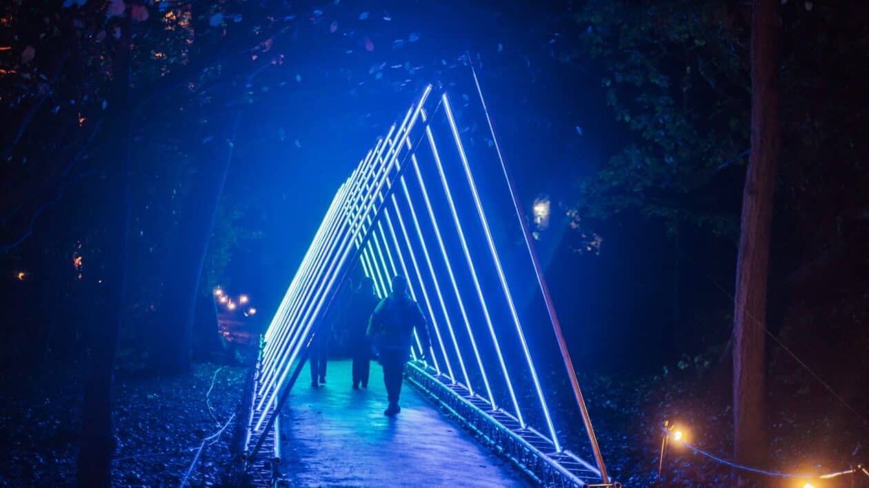 walking through a tunnel of lights