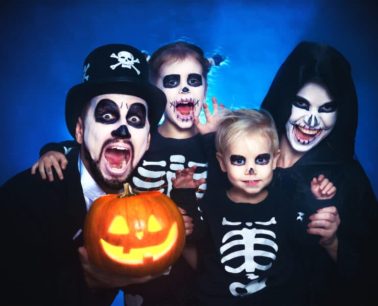 family dressed up as skeletons