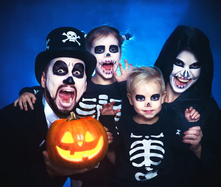 family dressed up as skeletons