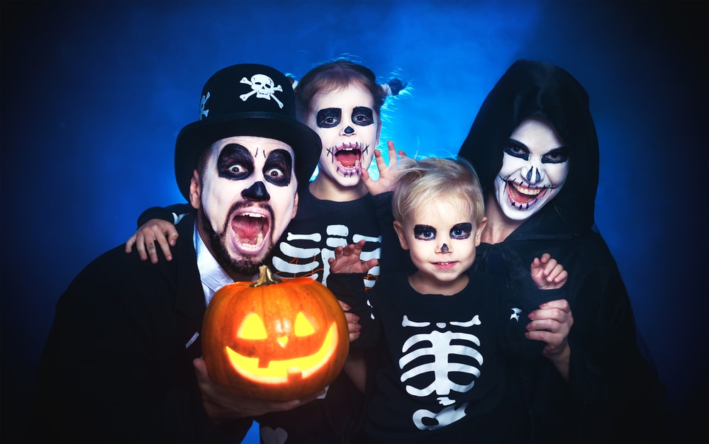 family dressed up as skeletons
