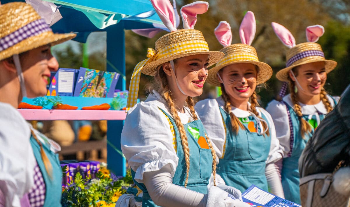 easter event at chessington with people wearing bunny ears