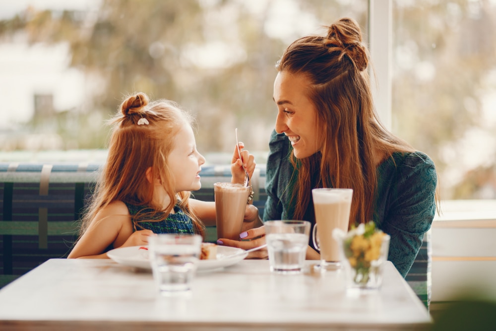 mom and daughter at a cafe