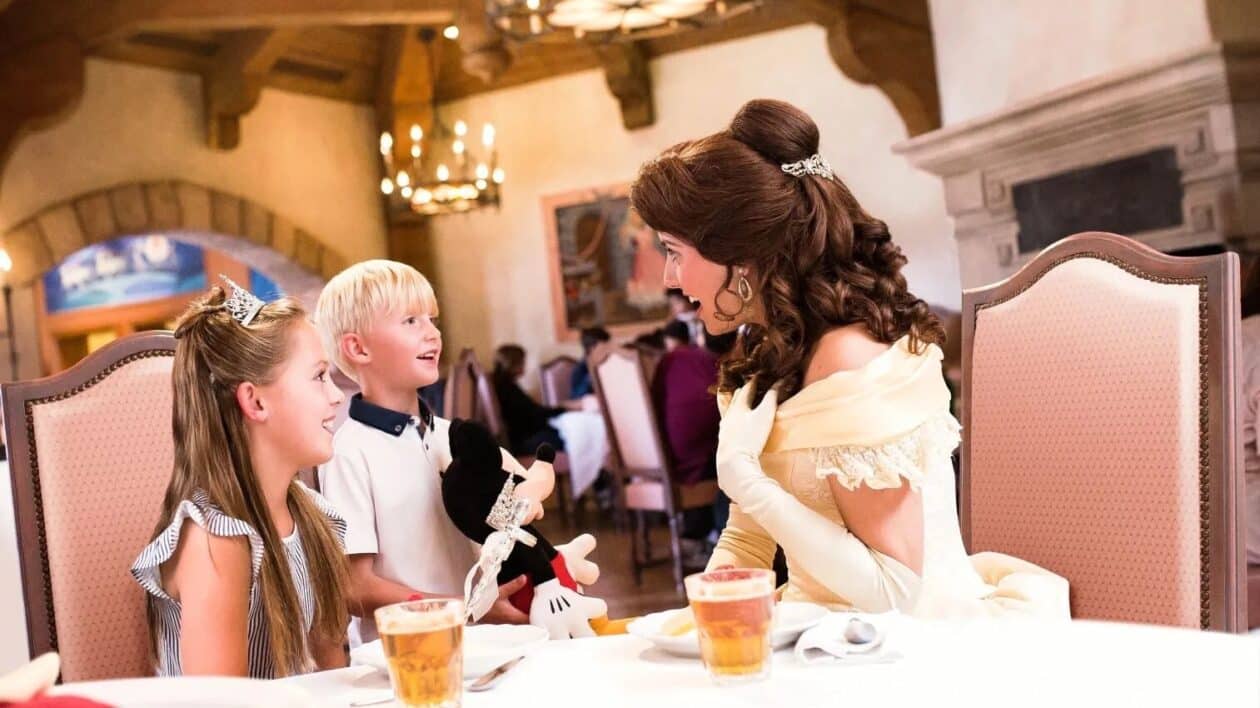 belle sitting with a little boy and girl
