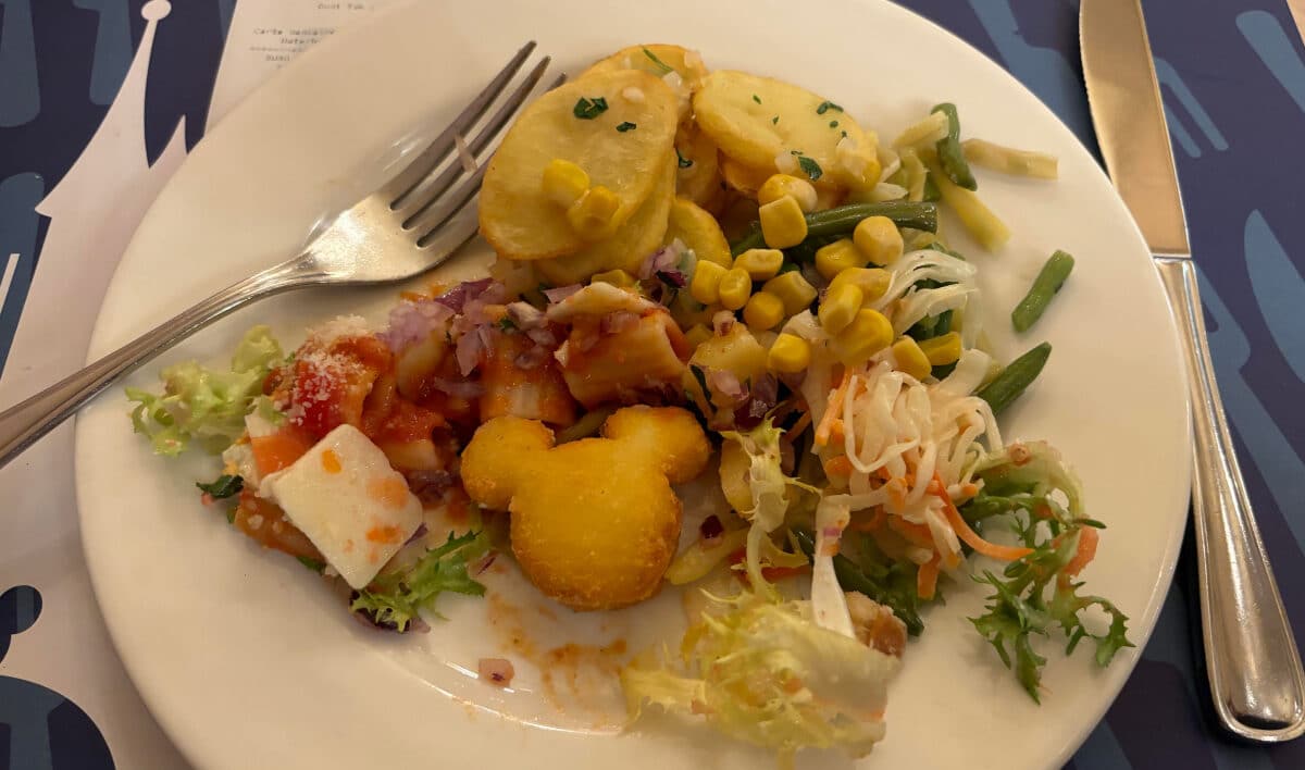 Mickey Mouse shaped potato croquette with salad