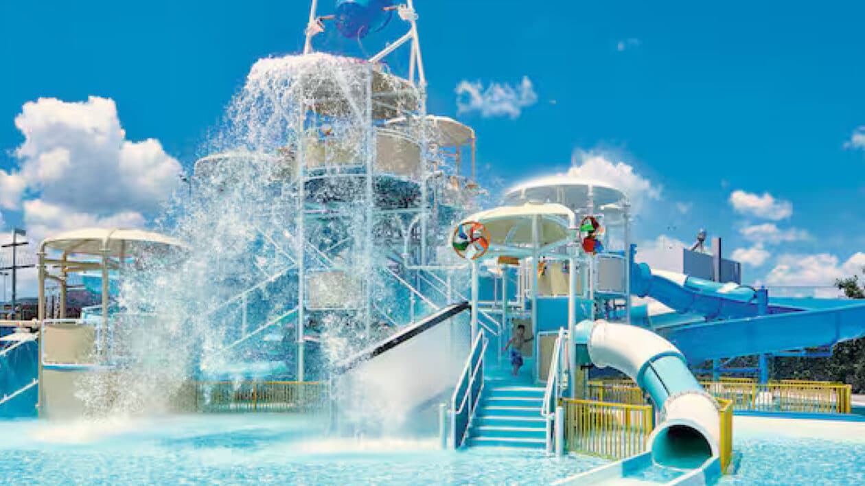 waterpark with a bucket pouring water below