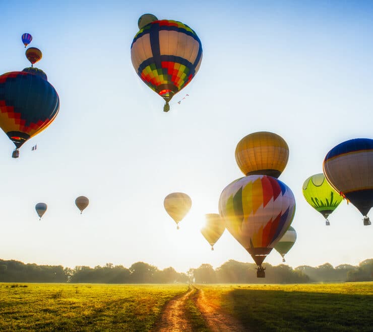 hot air balloons at sunrise