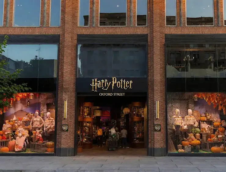 An interior view of the Harry Potter Store Oxford Street, showcasing various merchandise displays and themed decor.