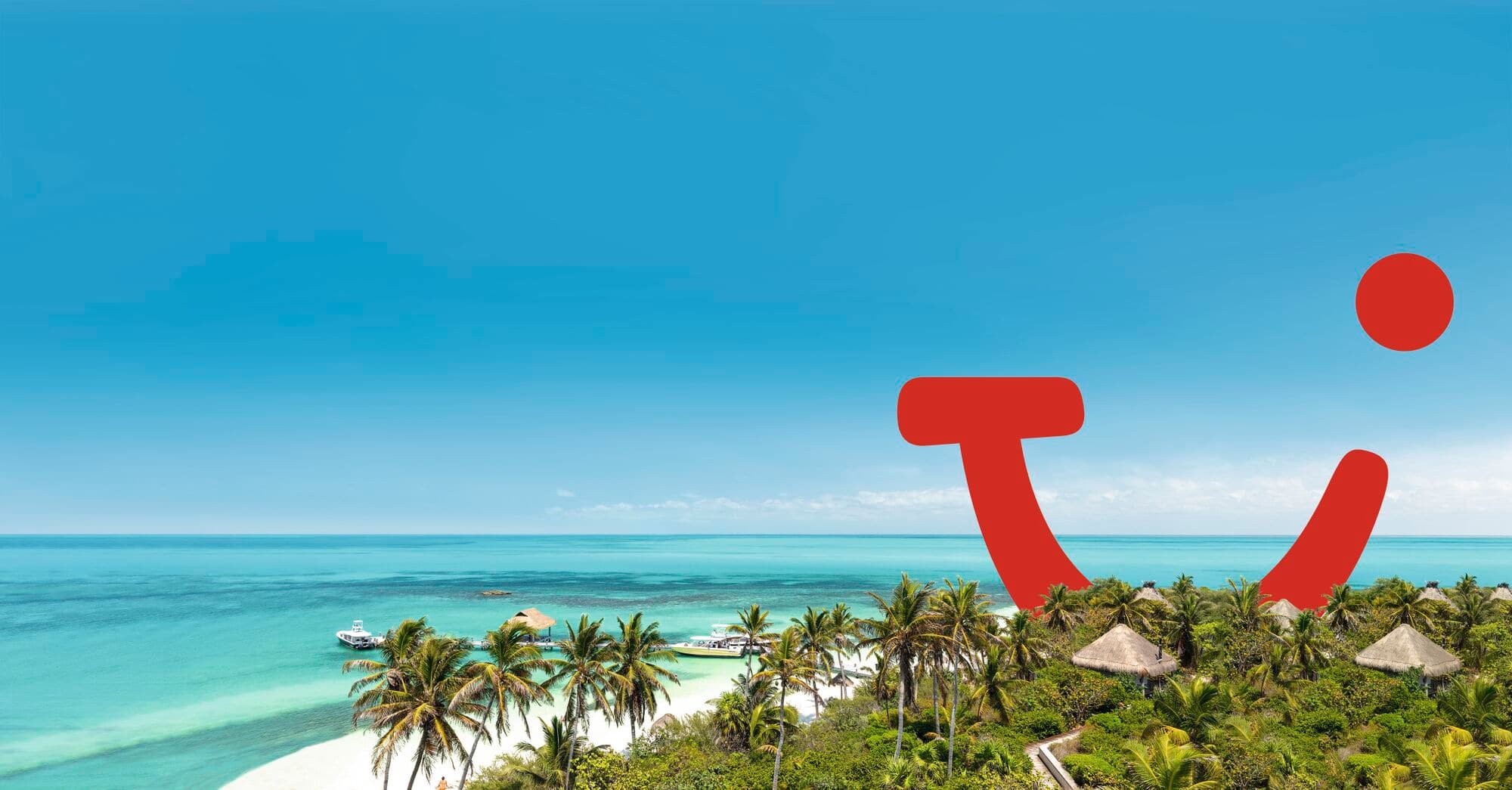 A smiling young woman on a TUI holiday, enjoying the TUI Smiles Rewards Club benefits.